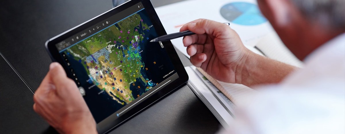 A man looking at Sferic Maps on his tablet