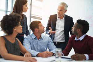 Cropped shot of corporate businesspeople in the boardroom